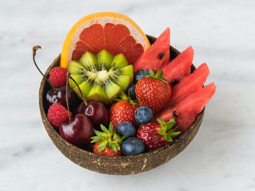 A bowl of colorful fruit symbolic for the Fruit of the Spirit Love.