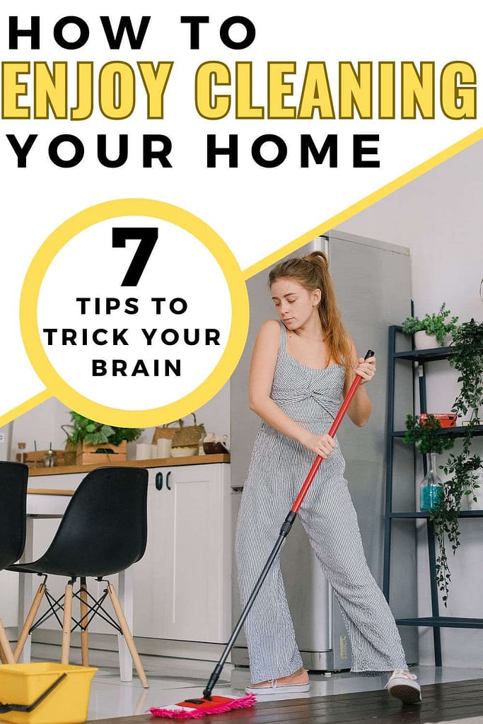Pinterest Graphic: How to Enjoy Cleaning your Home. 7 Tips that will Trick your brain. A woman is dancing while moping her kitchen.